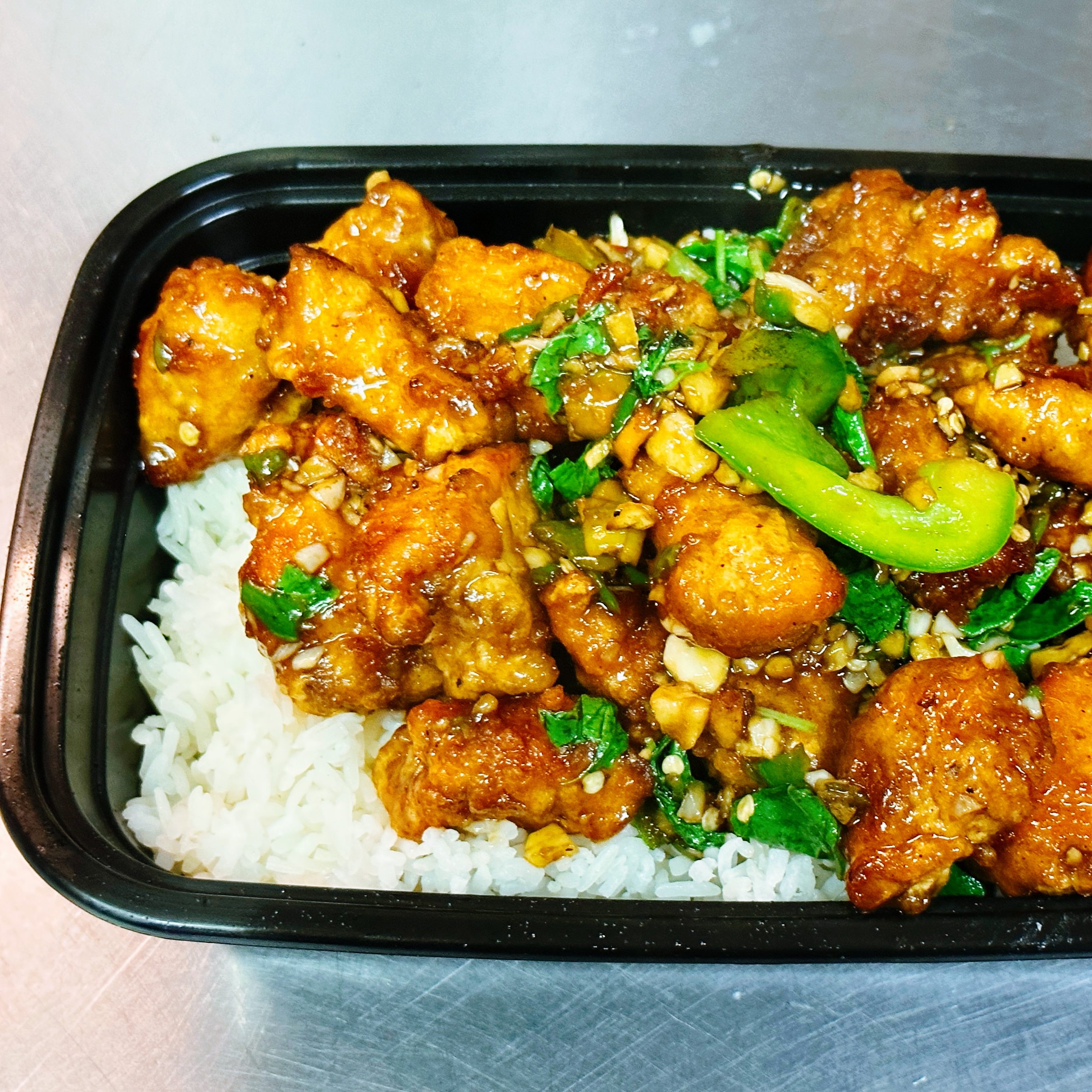Crispy Chicken Ka Pow Over Rice 🔥.